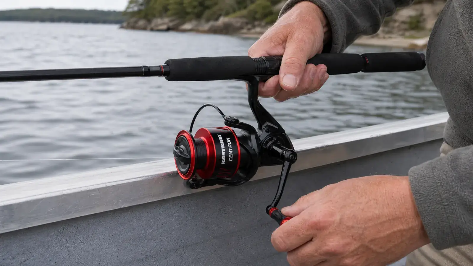 Close-up of a KastKing Centron spinning reel with the bail open, showing line coming off the spool cleanly